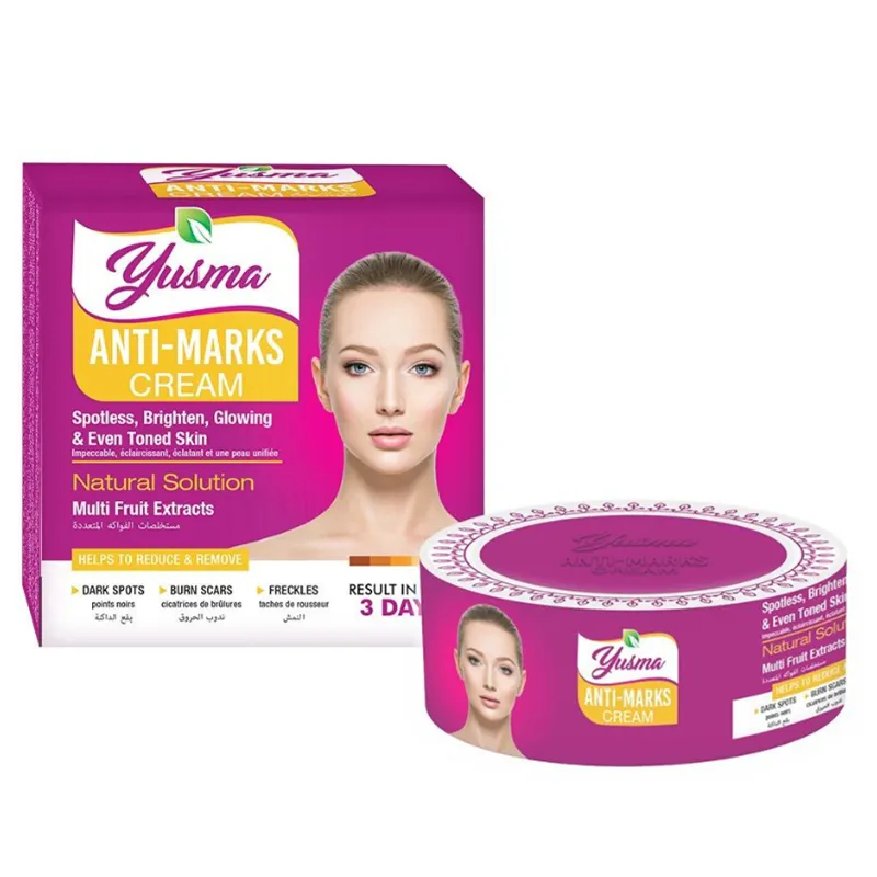 Yusma Anti-Marks Cream container for fading dark spots, freckles, and skin scars naturally.
